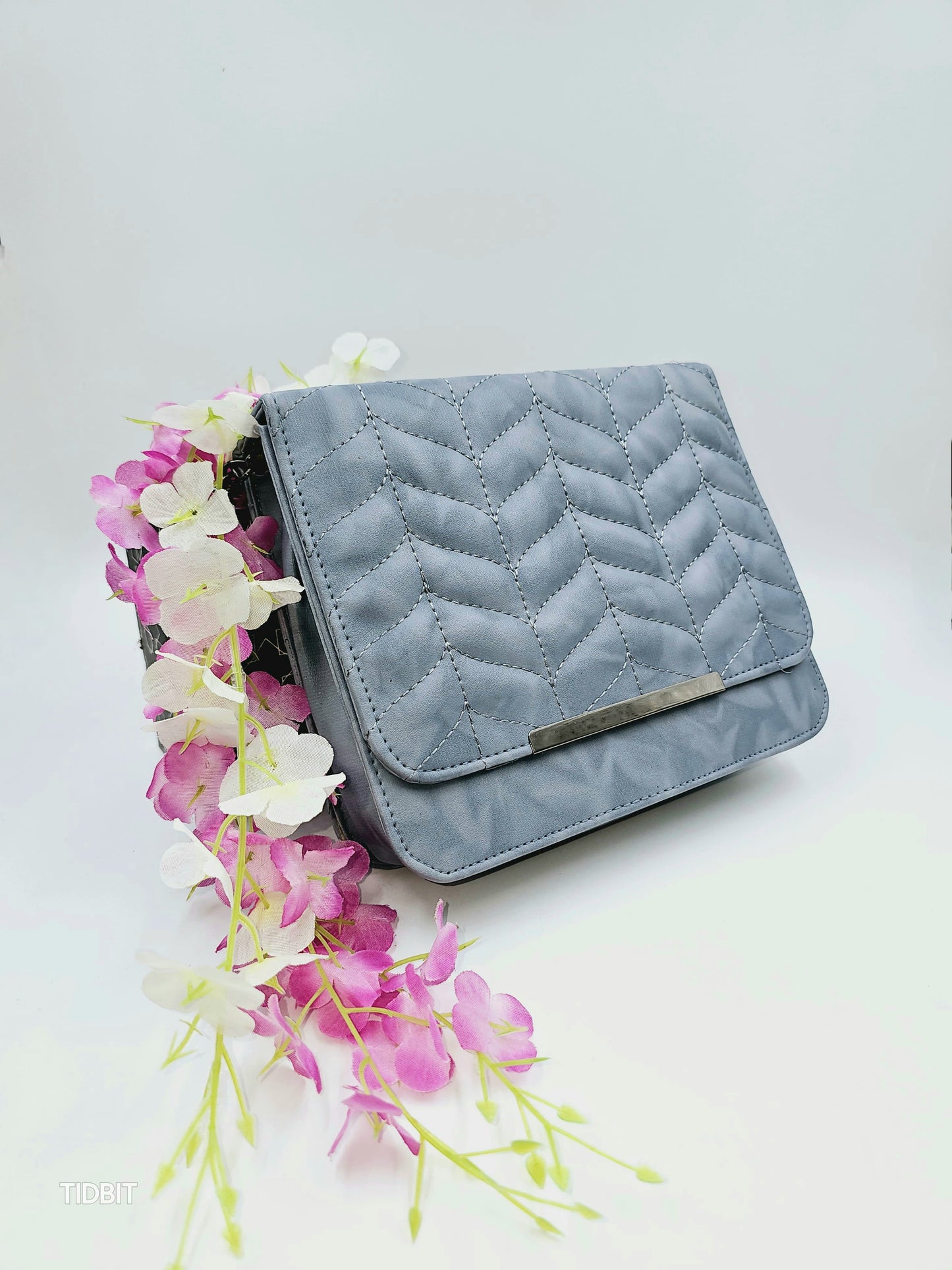 TIDBIT SLING BAGS