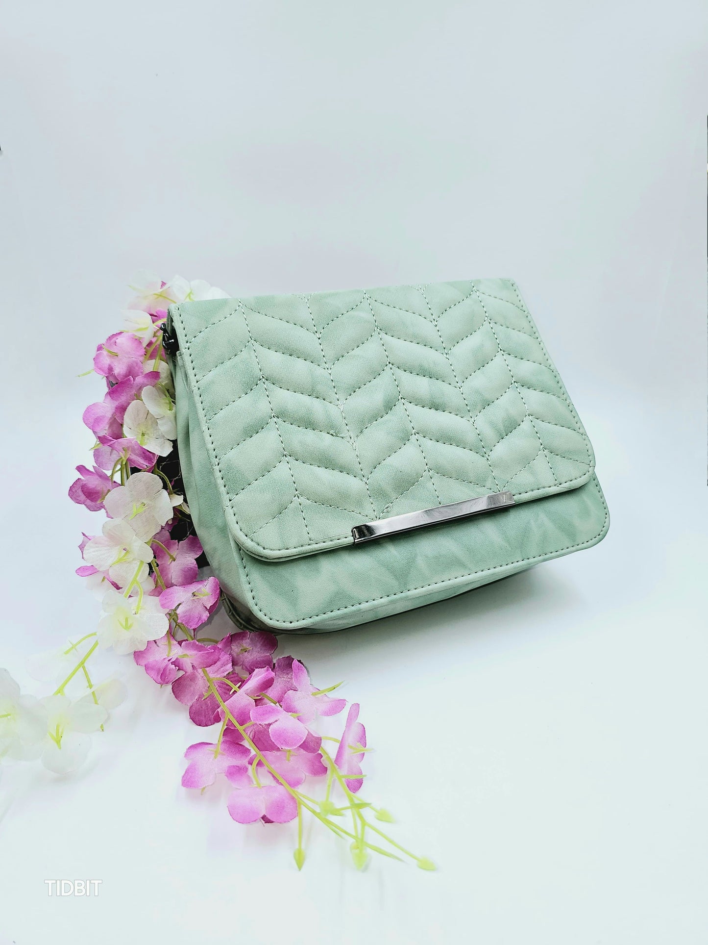 TIDBIT SLING BAGS