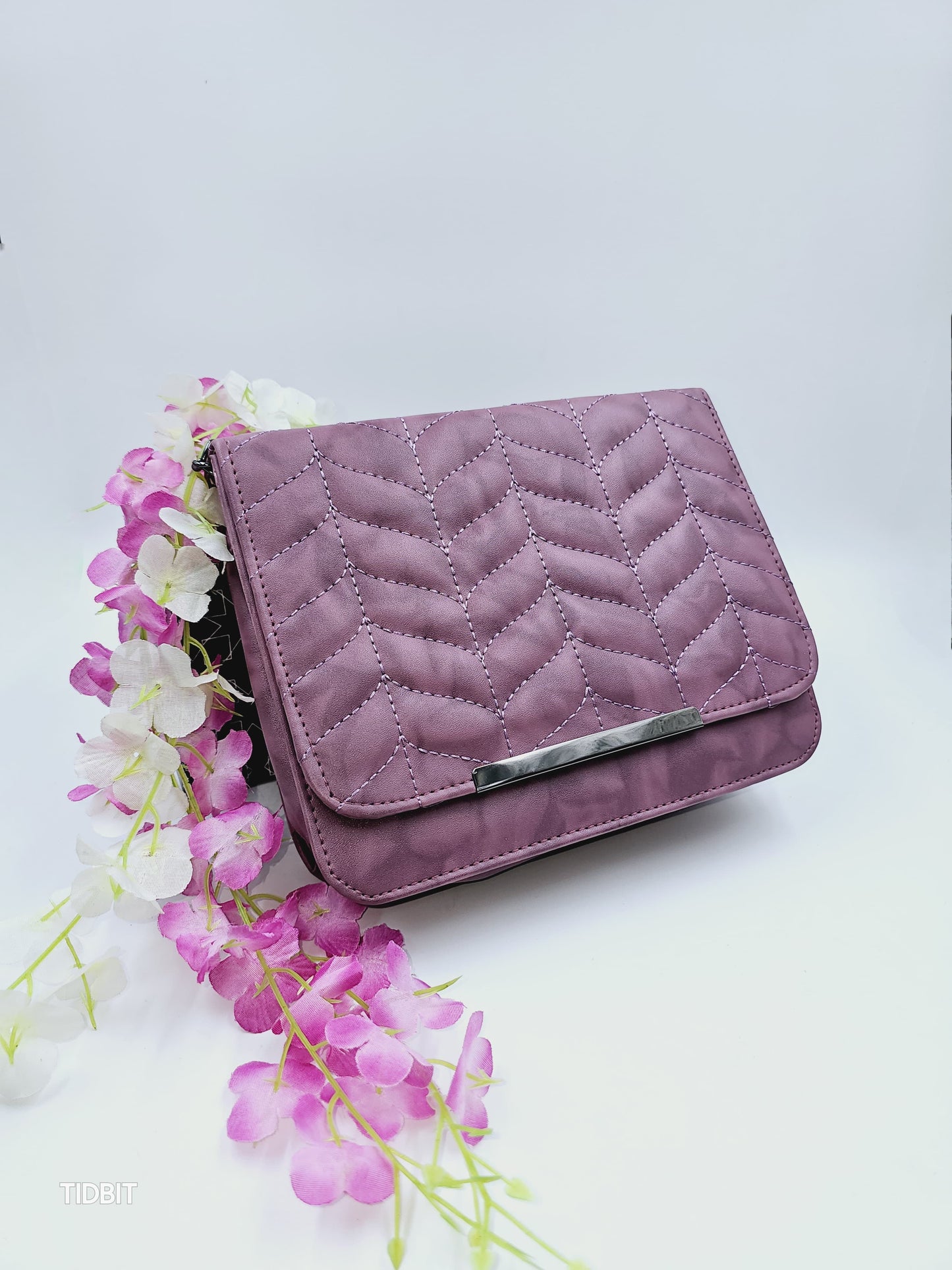 TIDBIT SLING BAGS